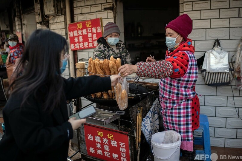 米、「断固とした」コロナ起源調査を要求 WHO報告書の「信頼性」評価へ
