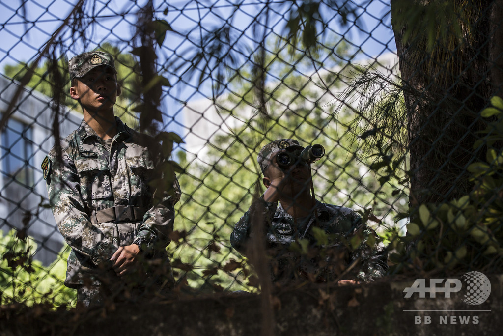 中国、香港当局からの要請ない駐屯部隊の出動を擁護