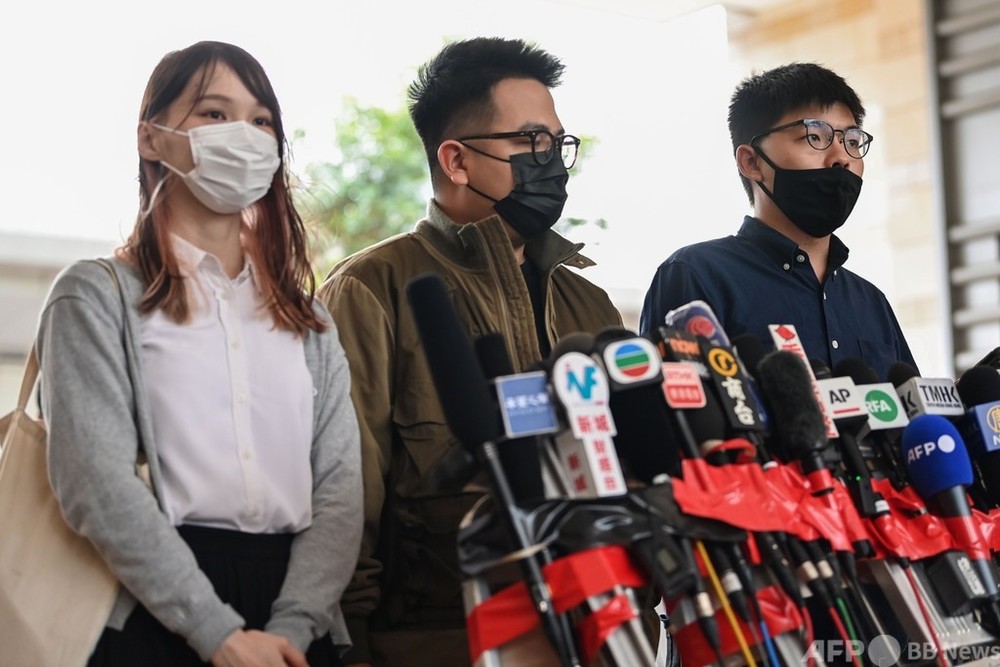 香港活動家の黄之鋒氏、周庭氏ら収監 デモ扇動の罪認める