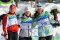 2010年%%バンクーバー冬季五輪%%、クロスカントリースキー女子個人スプリント決勝。フラワーセレモニーで歓喜する（左から）2位のユスチナ・コワルチク、優勝したマリット・ビョルゲン、3位のペトラ・マジッチ。（2010年2月17日撮影）(c)AFP/DON EMMERT