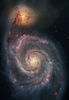 米航空宇宙局（NASA）などが公表した、銀河や星雲の画像、地球の衛星写真などを紹介する。

写真は、ハッブル宇宙望遠鏡（Hubble Space Telescope）がとらえたりょうけん座の子持銀河M51の画像。掃天観測用高性能カメラ（Advanced Camera for Surveys）が撮影したものを加工して、より鮮明にした。

手前の巨大な渦巻銀河「NGC 5194」は幅が6万光年以上あり、背後の伴銀河「NGC 5195」と相互作用し合っている。M51は地球から約3100万光年離れたところにあり、北斗七星の「柄」の近くに位置する（2010年2月1日公開）。(c)AFP/Hubble Heritage Team, (STScI/AURA), ESA, S. Beckwith (STScI). Additional Processing: Robert Gendler