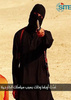 イスラム過激派「イスラム国（Islamic State、IS）」が公開し、米監視団体「SITEインテリジェンス・グループ（SITE Intelligence Group）」がイスラム国によるものと特定した動画の中でナイフを見せながらカメラに向かって話す米国人ジャーナリストを殺害したとみられる男（2014年9月2日提供、資料写真）。(c)AFP/HO/SITE INTELLIGENCE GROUP
