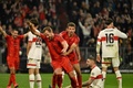 24-25ドイツ・ブンデスリーガ1部第7節、バイエルン・ミュンヘン対VfBシュツットガルト。ゴールを喜ぶバイエルン・ミュンヘンのハリー・ケイン（中央左、2024年10月19日撮影）。(c)LUKAS BARTH-TUTTAS/ AFP