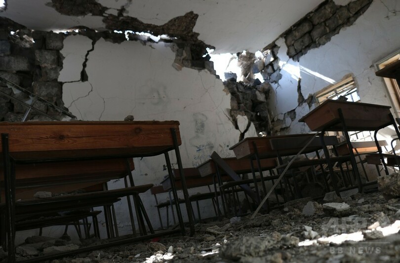 シリア政府軍、内戦発端の地に国旗掲揚 南部ダルアー市