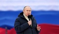 ロシア首都モスクワのルジニキ・スタジアムで開かれた集会で演説するウラジーミル・プーチン大統領（2022年3月18日撮影）。(c)Alexander VILF / POOL / AFP