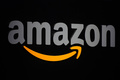 米アマゾン・ドットコムのロゴ（2011年9月28日撮影、資料写真）。(c)Emmanuel DUNAND / AFP)