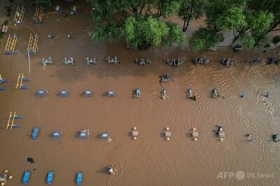 中国北部で豪雨、北京で30人死亡 8万人避難