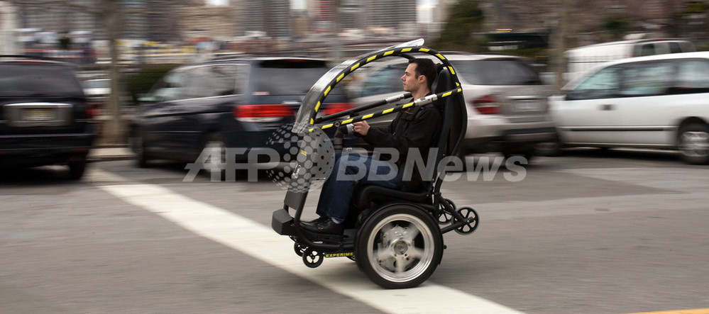 米GM、セグウェイと2人乗り2輪電気自動車を共同開発 写真5枚