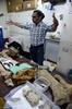 ベネズエラ・カラカス（Caracas）で、同国で発見された先史時代の動物の化石について説明するベネズエラ科学調査機関古生物学研究室のアスカニア・リンコン（Ascania Rincon）室長（2013年8月30日撮影）。(c)AFP/JUAN BARRETO