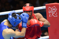ロンドン五輪は11日、エクセル（ExCeL London）でボクシング男子ミドル級決勝が行われ、村田諒太（Ryota Murata）は14-13の判定でブラジルのエスキバ・ファルカン（Esquiva Falcao Florentino）を破り、日本勢としては48年ぶりとなる金メダルを獲得した。

ブラジルのエスキバ・ファルカン（Esquiva Falcao Florentino、右）と対戦する村田諒太（Ryota Murata、2012年8月11日撮影）。(c)AFP/DAMIEN MEYER