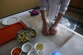 北朝鮮の首都平壌で開催された料理コンテストで腕を振るうシェフ（2019年2月13日撮影）。(c) Ed JONES / AFP