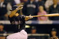 延長13回に逆転サヨナラ犠牲フライを放つジェイミー・キャロル（%%Jamey Carroll%%）。(c)AFP/Getty Images Steve Dykes