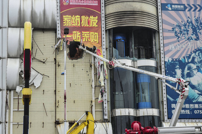 中国恵州の商業ビルで火災、17人死亡 9歳少年を拘束