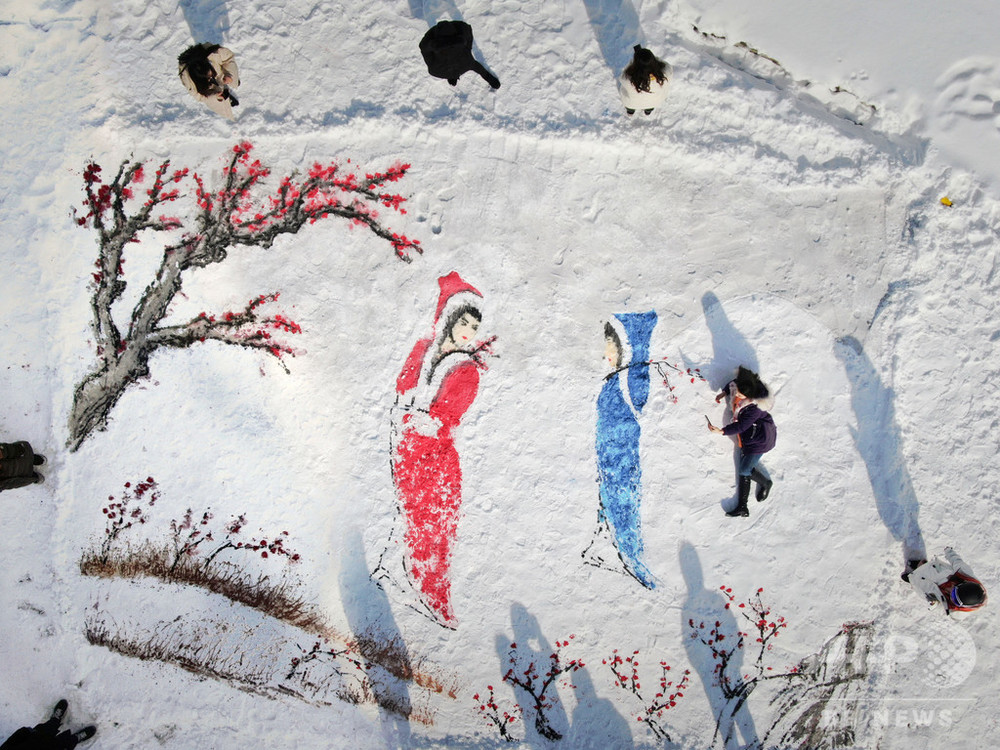 雪のキャンバスに鮮やかに…伝統絵画現る 中国・洛陽市 写真6枚 国際