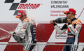 世界ロードレース選手権（WGP 2012）第18戦バレンシアGPは11日、スペインのバレンシア・サーキット（Circuit de la Comunitat Valenciana Ricardo Tormo）でMotoGPクラス決勝が行われ、レプソル・ホンダ（Repsol Honda）のダニ・ペドロサ（Dani Pedrosa）が48分23秒819で優勝を飾った。

表彰台でシャンパンを振るレプソル・ホンダのケーシー・ストーナー（Casey Stoner、右）とダニ・ペドロサ（2012年11月11日撮影）。(c)AFP/JOSE JORDAN