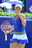 女子テニス、韓国オープン（KDB Korea Open 2012）は22日、韓国のソウル（Seoul）で行われ、大会第1シードのカロリーネ・ボズニアツキ（Caroline Wozniacki、デンマーク）は6-1、6-0で第3シードのカイア・カネピ（Kaia Kanepi）を下し、優勝を飾った。

試合に勝利し、ガッツポーズを見せるカロリーネ・ボズニアツキ（2012年9月22日撮影）。(c)AFP/JUNG YEON-JE