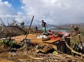 フィリピン・ディナガットの台風被害。副大統領事務所提供（2021年12月19日撮影、同20日入手）。(c)STRINGER / AFP