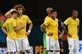 サッカーW杯ブラジル大会（2014 World Cup）3位決定戦、ブラジル対オランダ。敗戦に落胆するブラジルの（左から）オスカル（Oscar dos Santos Emboaba Junior）、ダビド・ルイス（David Luiz）、フッキ（Hulk）、フェルナンジーニョ（Fernandinho、2014年7月12日撮影）。(c)AFP/VANDERLEI ALMEIDA