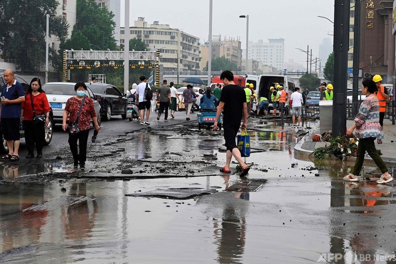 中国中部豪雨、死者51人に