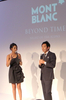 都内・六本木のメルセデス・ベンツ コネクションで開催されたモンブラン（Montblanc）のイベント「BEYOND TIME / NIGHT of The Icons」に登場した石田純一（Junichi Ishida、右）とモデルのレナ（Rena、2012年9月21日撮影）。(c)MODE PRESS