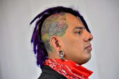 中米エルサルバドル首都でタトゥーの祭典