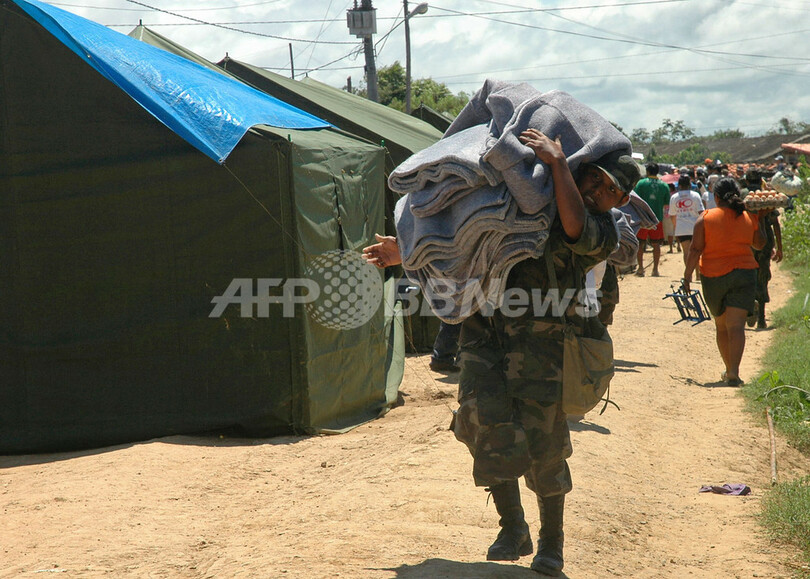 豪雨と洪水、急速に広まる伝染病に懸念 - ボリビア