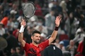 男子テニス、上海マスターズ、シングルス準々決勝。勝利を喜ぶノバク・ジョコビッチ（2024年10月11日撮影）。(c)Hector RETAMAL/ AFP