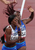 東京五輪、陸上混合4×400メートルリレー予選に臨む米国のテイラー・マンソン（手前）とリナ・アービー（2021年7月30日撮影）。(c)Giuseppe CACACE / AFP