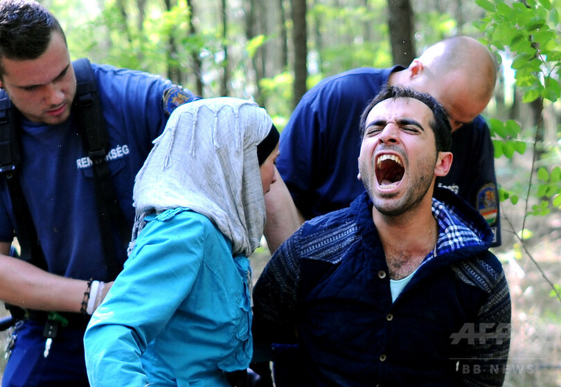 「シリアでは死に直面･･･有刺鉄線など怖くない」 ハンガリーに入る難民たち