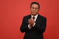 中国共産党の最高指導部の政治局常務委員に選出された李強氏（2022年10月23日撮影）。(c)Noel CELIS / AFP