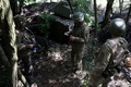 ウクライナ東部の激戦地バフムートの前線に配置された同国軍（2023年7月15日撮影）。(c)Anatolii Stepanov / AFP