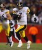 スクランブルを仕掛けるスティーラーズのQBベン・ロスリスバーガー（%%Ben Roethlisberger%%）。(c)AFP/Getty Images Jim Rogash
