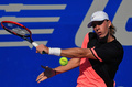 テニス、メキシコ・オープン、男子シングルス1回戦。リターンを打つデニス・シャポバロフ（2018年2月27日撮影）。(c)AFP PHOTO / PEDRO PARDO