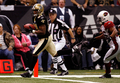 第2Qにタッチダウンレシーブを決めるセインツのビッド・パッテン（%%David Patten%%、左）。(c)AFP/Getty Images Chris Graythen