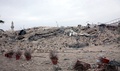 シリア北部アレッポ（Aleppo）で、政府軍の拠点として利用され、反体制派によって爆破されたホテル（2014年5月8日撮影）。(c)AFP