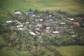 フィリピン・カガヤン州ツゲガラオで、台風22号（アジア名：マンクット）によって損壊した家屋（2018年9月16日撮影）。(c)TED ALJIBE / AFP