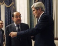 イラクのヌーリ・マリキ（Nuri al-Maliki）首相（左）とジョン・ケリー（John Kerry）米国務長官（右）。イラク・バグダッド（Baghdad）で（2013年3月24日撮影）。(c)AFP/JASON REED