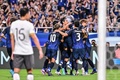 2026年サッカーW杯北中米大会アジア最終予選、グループC、日本対中国。遠藤航の得点を喜ぶ日本の選手（2024年9月5日撮影）。(c)Yuichi YAMAZAKI / AFP