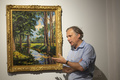 ウィンストン・チャーチル元英首相が描いた風景画「The Moat, Breccles」。米ニューヨークで（2021年6月18日撮影）。(c)Kena Betancur / AFP