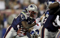 第2Qに1ヤードのTDランを決めるペイトリオッツのRBローレンス・マロニー（%%Laurence Maroney%%、左）。(c)AFP/Getty Images/Andy Lyons