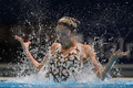 第15回世界水泳選手権（15th FINA World Championships）は24日、スペイン・バルセロナ（Barcelona）でシンクロナイズドスイミングのソロフリールーティン（FR）決勝が行われ、ロシアのスベトラナ・ロマシナ（Svetlana Romashina）が優勝した。

2位には中国の黄雪辰（Huang Xuechen）、3位にはスペインのオナ・カルボネール・バレステロ（Ona Carbonell Ballestero）が入った。

ソロFR決勝の演技に臨む乾友紀子（Yukiko Inui、2013年7月24日撮影）。(c)AFP/JAVIER SORIANO
