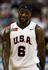 フリースローを得て笑顔を見せる米国のレブロン・ジェームズ（%%LeBron James%%）。(c)AFP/Getty Images Jamie Squire