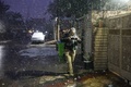 イラク首都バグダッドで、雪の中写真を撮る男性（2020年2月11日撮影）。(c)SABAH ARAR / AFP