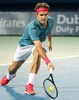 ドバイ・テニス選手権（Dubai Duty Free Tennis Championships 2014）、男子シングルス準決勝。リターンを打つロジャー・フェデラー（Roger Federer、2014年2月28日撮影）。(c)AFP/MARWAN NAAMANI