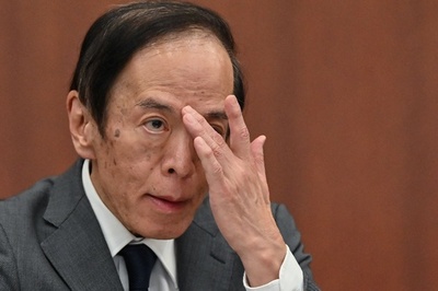 Japan central bank chief admits 'big gap' on women officials