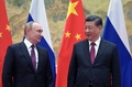 中国・北京で会談した習近平国家主席（右）とロシアのウラジーミル・プーチン大統領（2022年2月4日撮影、資料写真）。(c)Alexei Druzhinin / Sputnik / AFP