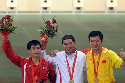 秦鍾午 男子50メートルピストルで金メダル