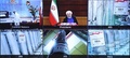 イラン中部ナタンズのウラン濃縮施設にある遠心分離機などの機器と、同国のハッサン・ロウハニ大統領を映したテレビ会議の画面。イラン大統領府提供（2021年4月10日提供）。(c)AFP PHOTO / HO / IRANIAN PRESIDENCY