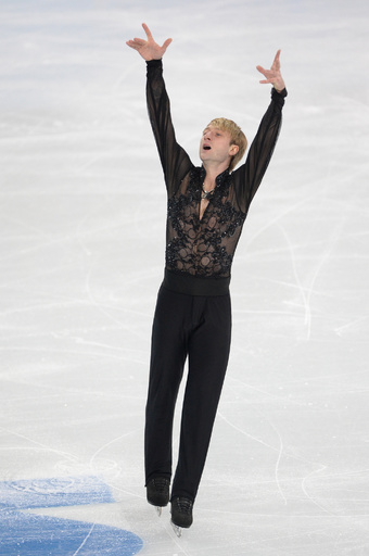 フィギュア団体戦・男子FSで首位のプルシェンコ、ソチ五輪 写真