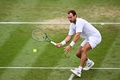 テニス、ウィンブルドン選手権、男子シングルス4回戦。リターンを打つロマン・サフィウリン（2023年7月9日撮影）。(c)SEBASTIEN BOZON / AFP